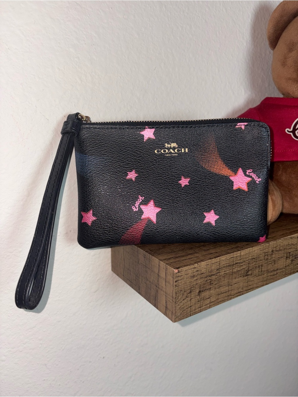 COACH Black Wristlet with Pink Star Print
